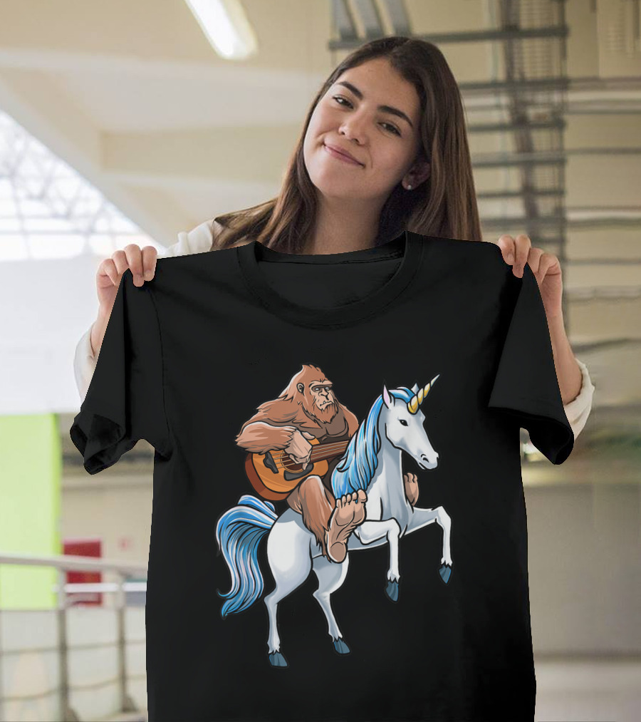 Bigfoot Playing Guitar Riding a Unicorn T-Shirt