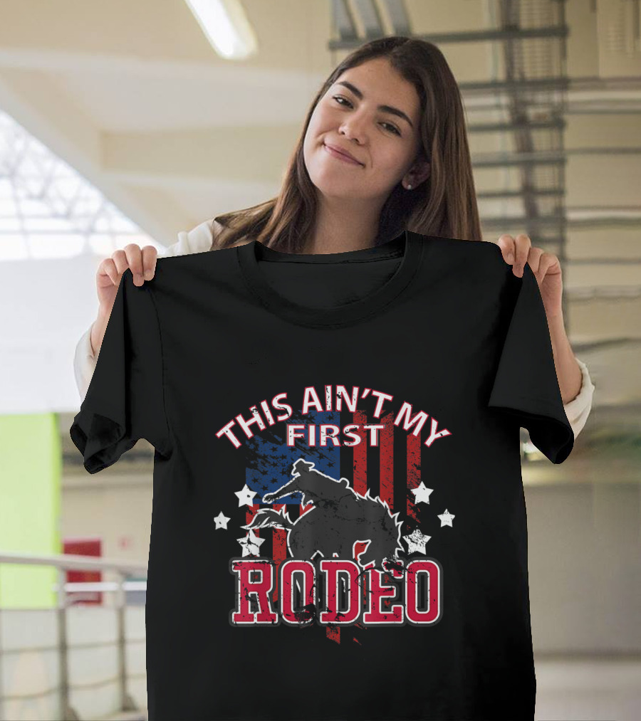 This Ain’t My First Rodeo Patriotic Cowboys American Flag Bull Rider T-Shirt
