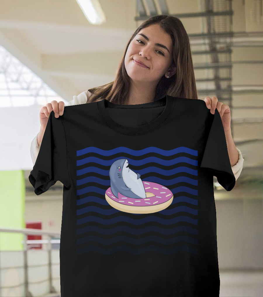 Shark Floating on Pink Donut Worry Human with Blue Waves T-Shirt