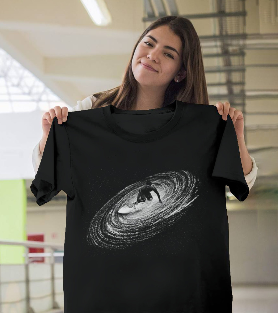 Surfer Riding Galaxy Spiral in Space Adventure T-Shirt