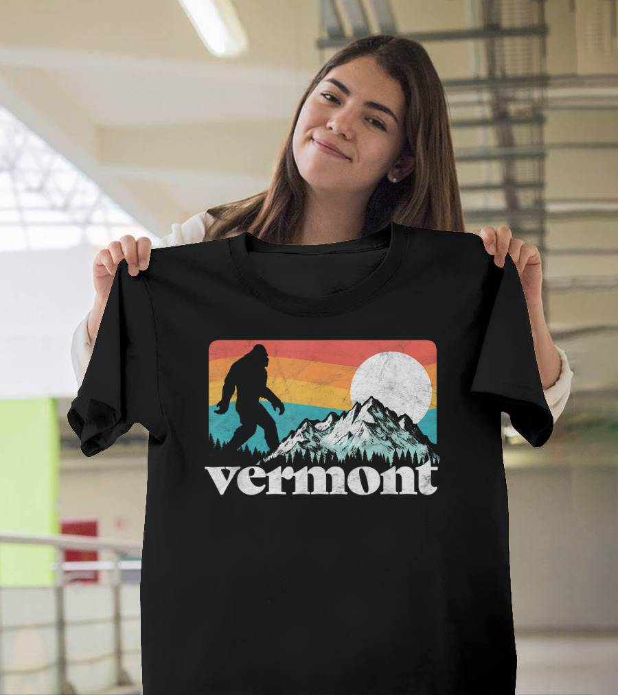 Vermont Bigfoot Silhouette with Mountains and Sun on Vintage Rainbow Background T-Shirt