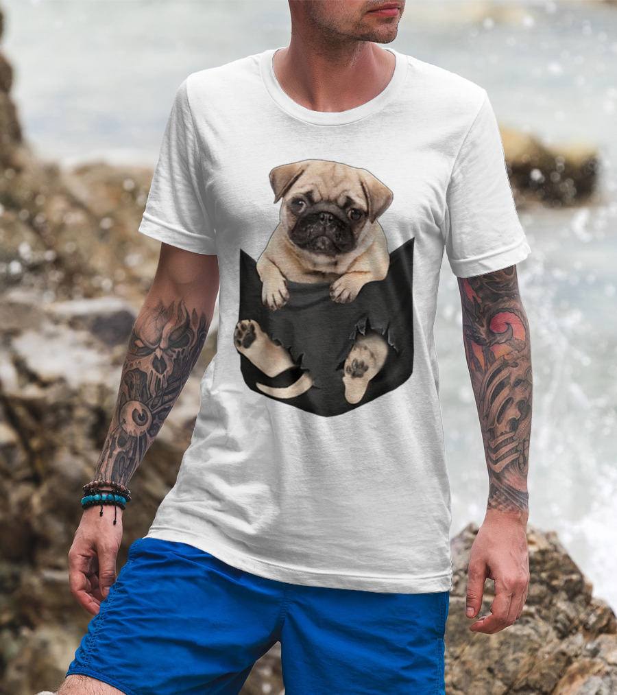 Pug Peeking Out Of Pocket With Paws Poking Through T-Shirt