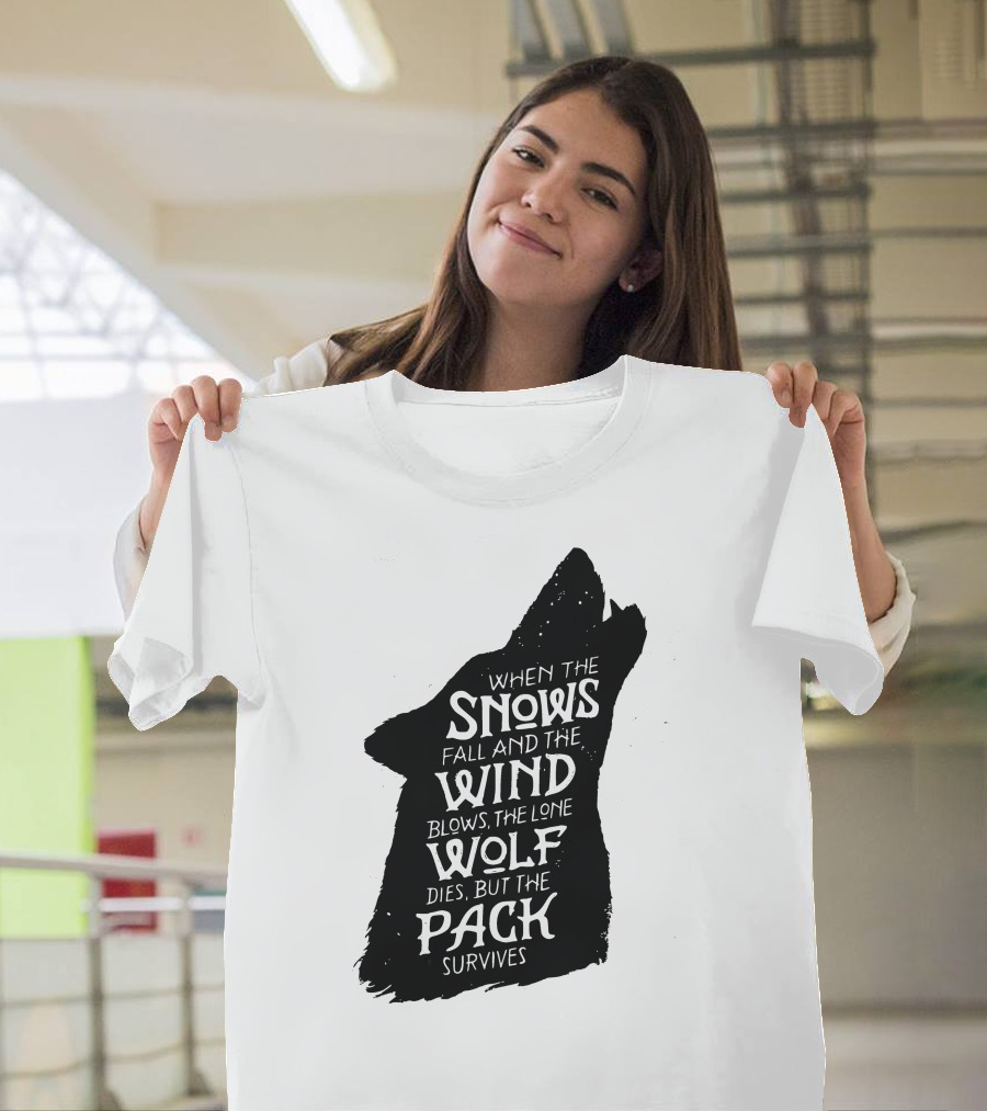 When the Snows Fall and the Wind Blows the Lone Wolf Dies But the Pack Survives T-Shirt