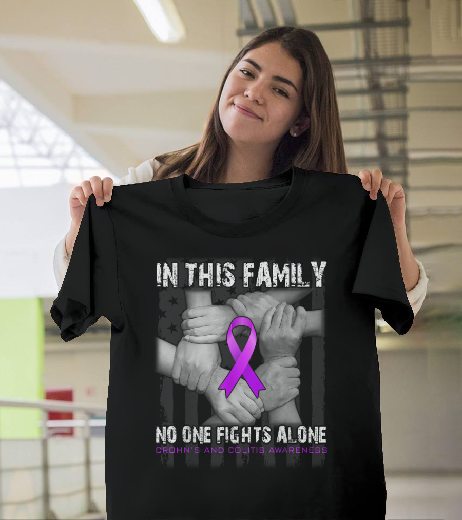 IN THIS FAMILY NO ONE FIGHTS ALONE CROHN'S AND COLITIS AWARENESS PURPLE RIBBON HANDS UNITED T-Shirt
