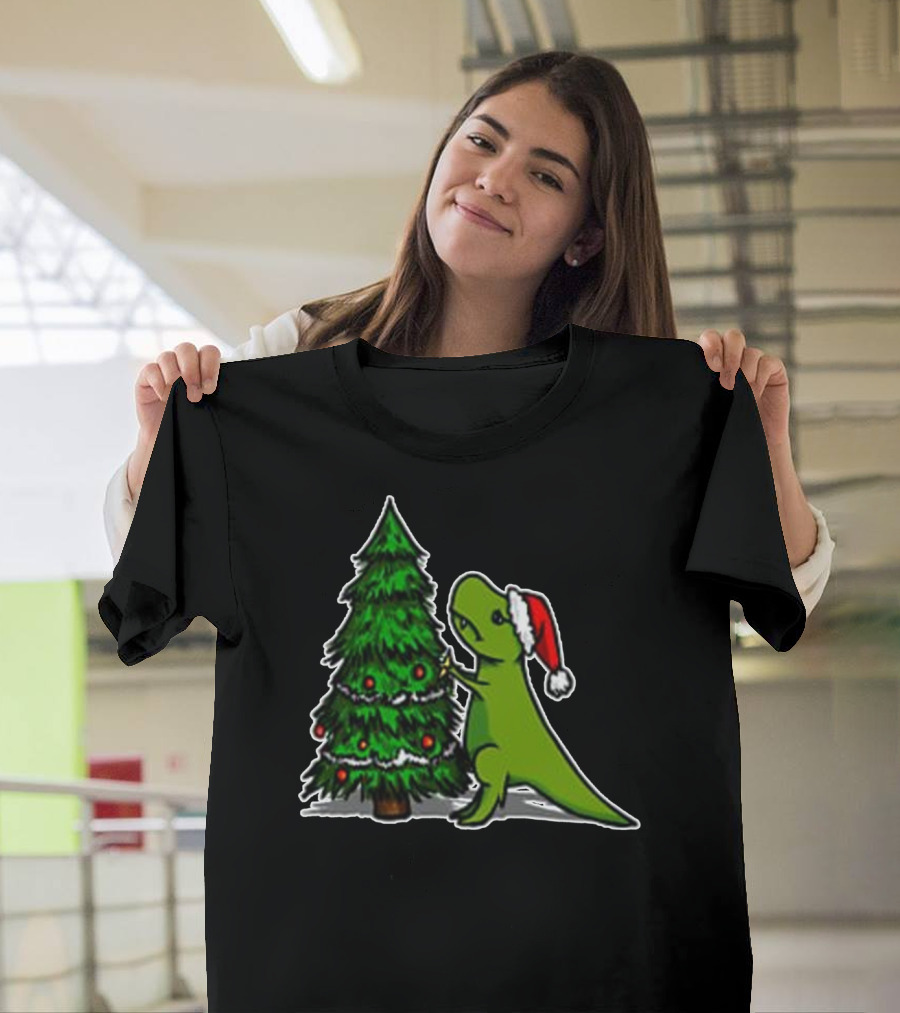 Funny Trex Dinosaur Struggling with Christmas Tree and Santa Hat T-Shirt