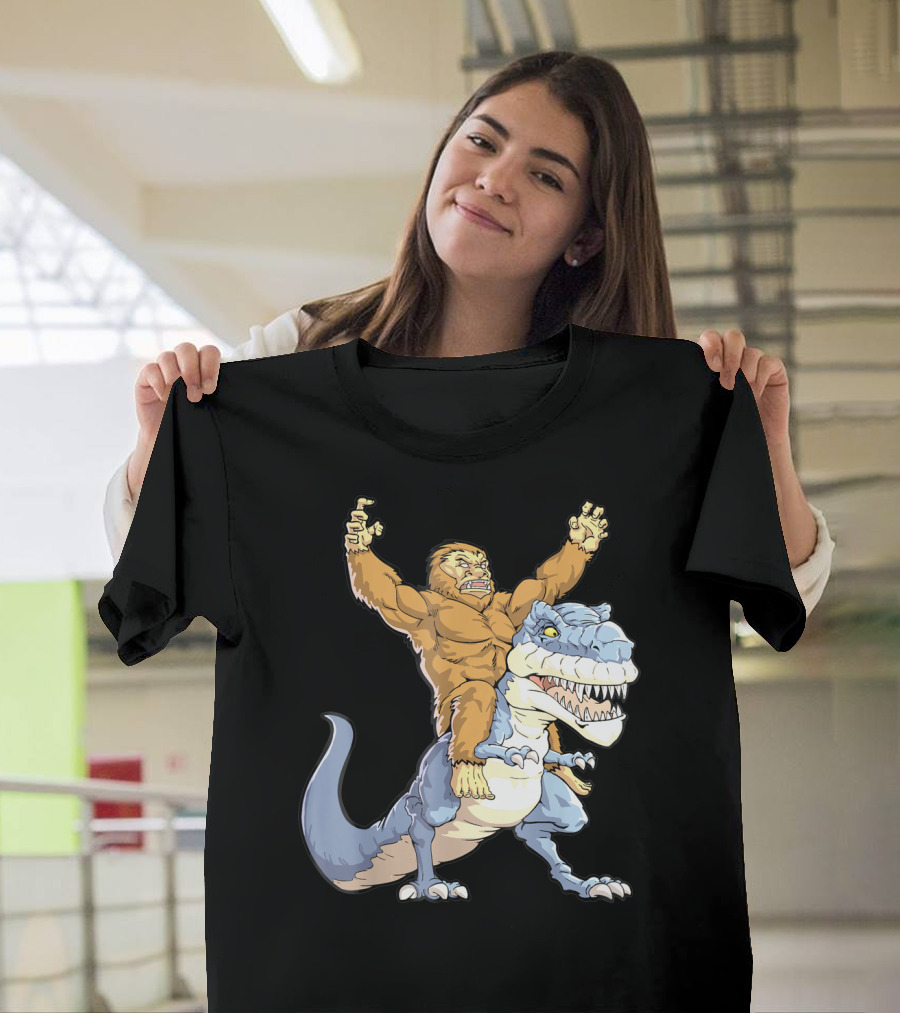 Bigfoot Sasquatch Riding Dinosaur Adventure T-Shirt