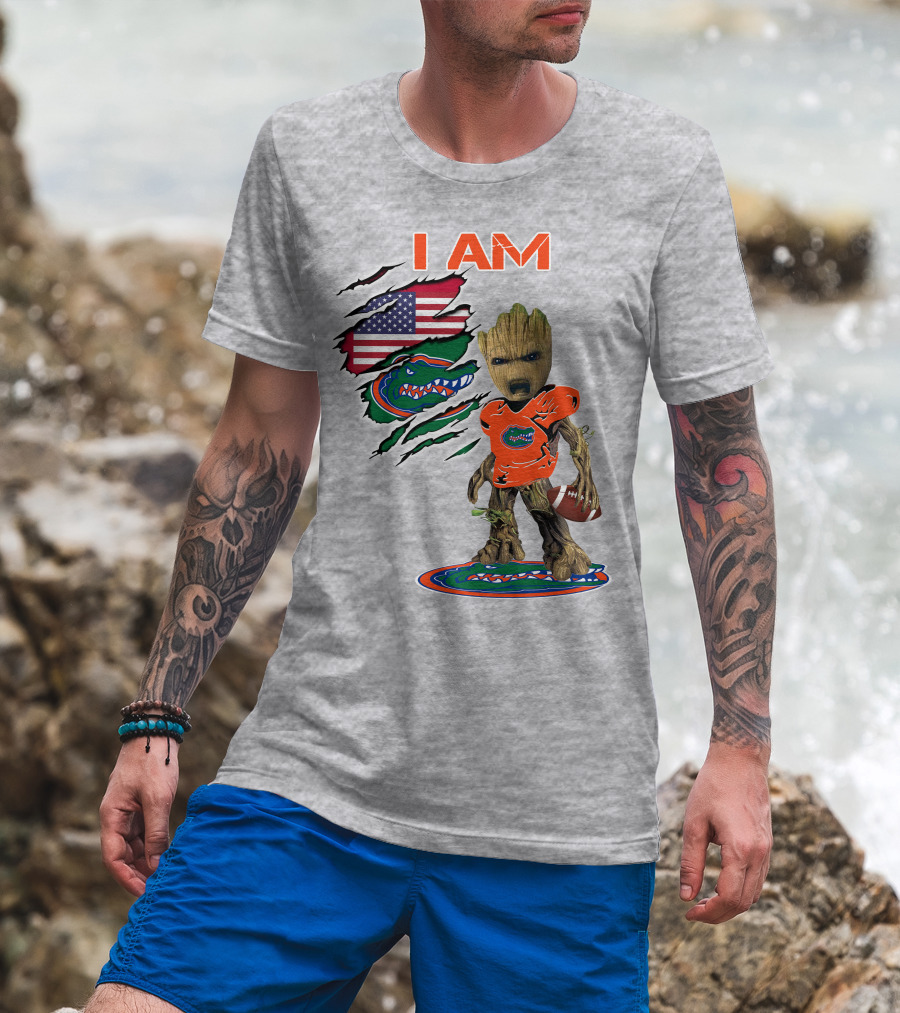 I Am Gators Baby Groot Holding Football With American Flag And Florida Gators T-Shirt