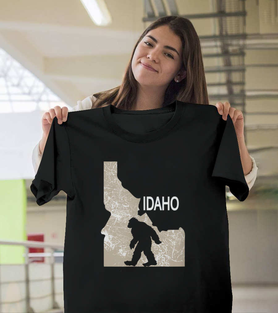 Funny Bigfoot Silhouette Walking in Idaho State Map I Believe Idaho Loves Bigfoot T-Shirt