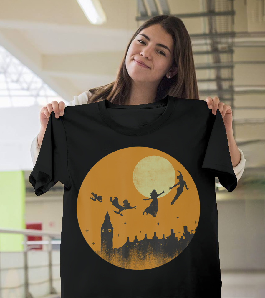 Disney Peter Pan and Darling Children Flying Silhouettes Against Orange Full Moon Over London Skyline T-Shirt