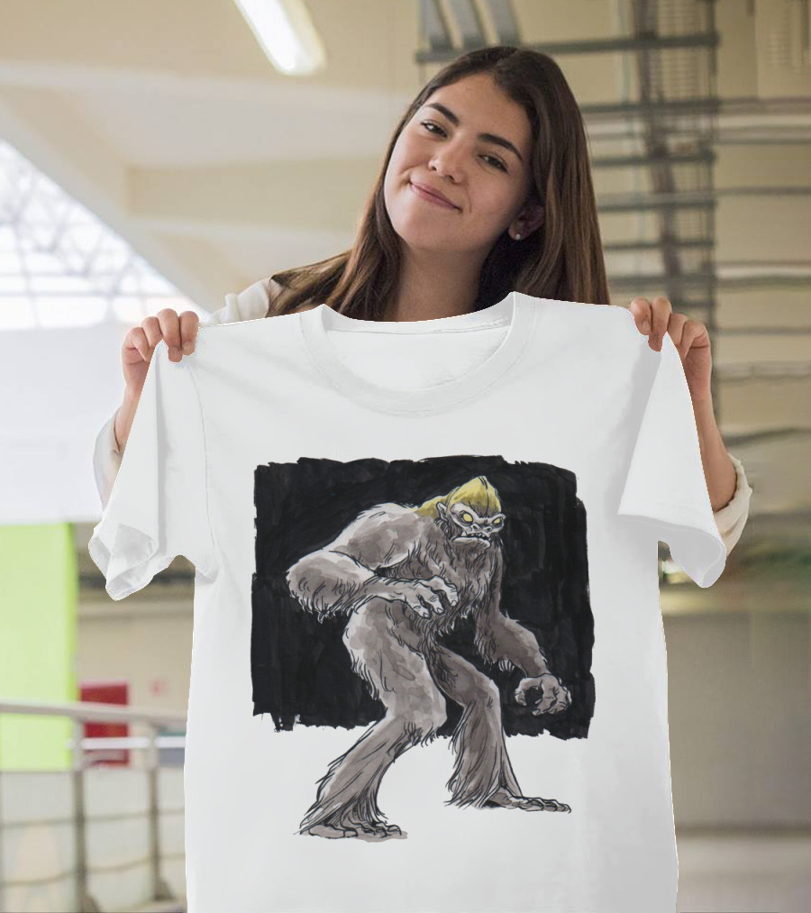 Old Yellow Top Bigfoot Creature with Yellow Hair in Dark Wilderness Scene T-Shirt