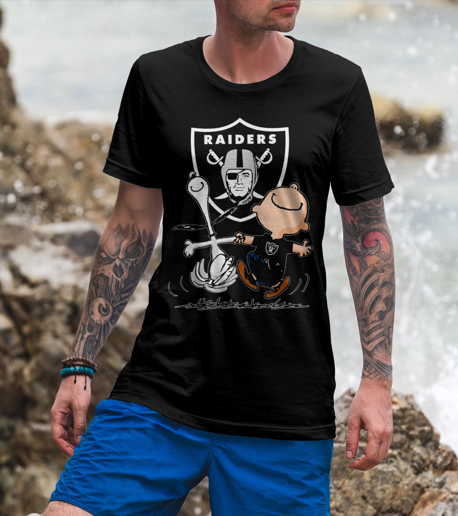 Snoopy And Charlie Brown Dancing In Front Of Oakland Raiders T-Shirt
