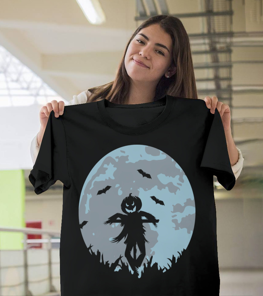 Pumpkin-Headed Scarecrow Silhouette with Bats and Full Moon in Cornfield Scene T-Shirt
