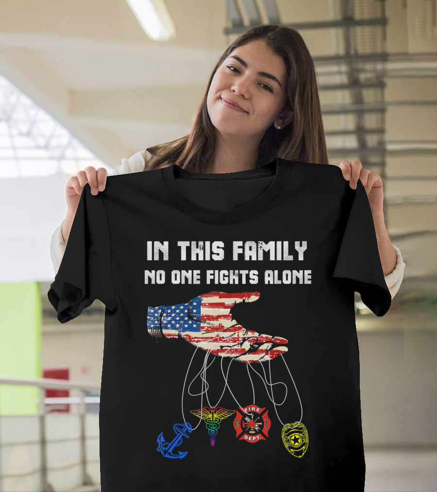 In This Family No One Fights Alone Veteran Firefighter American Flag Anchor EMT Badge T-Shirt