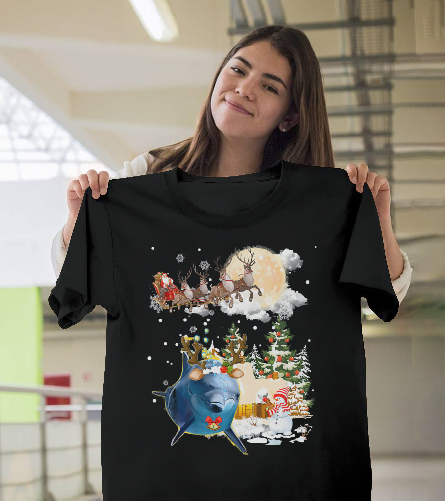 Santa's Sleigh Ride with Reindeer Amidst Christmas Trees and Snowman Accompanied by Festive Dolphin T-Shirt