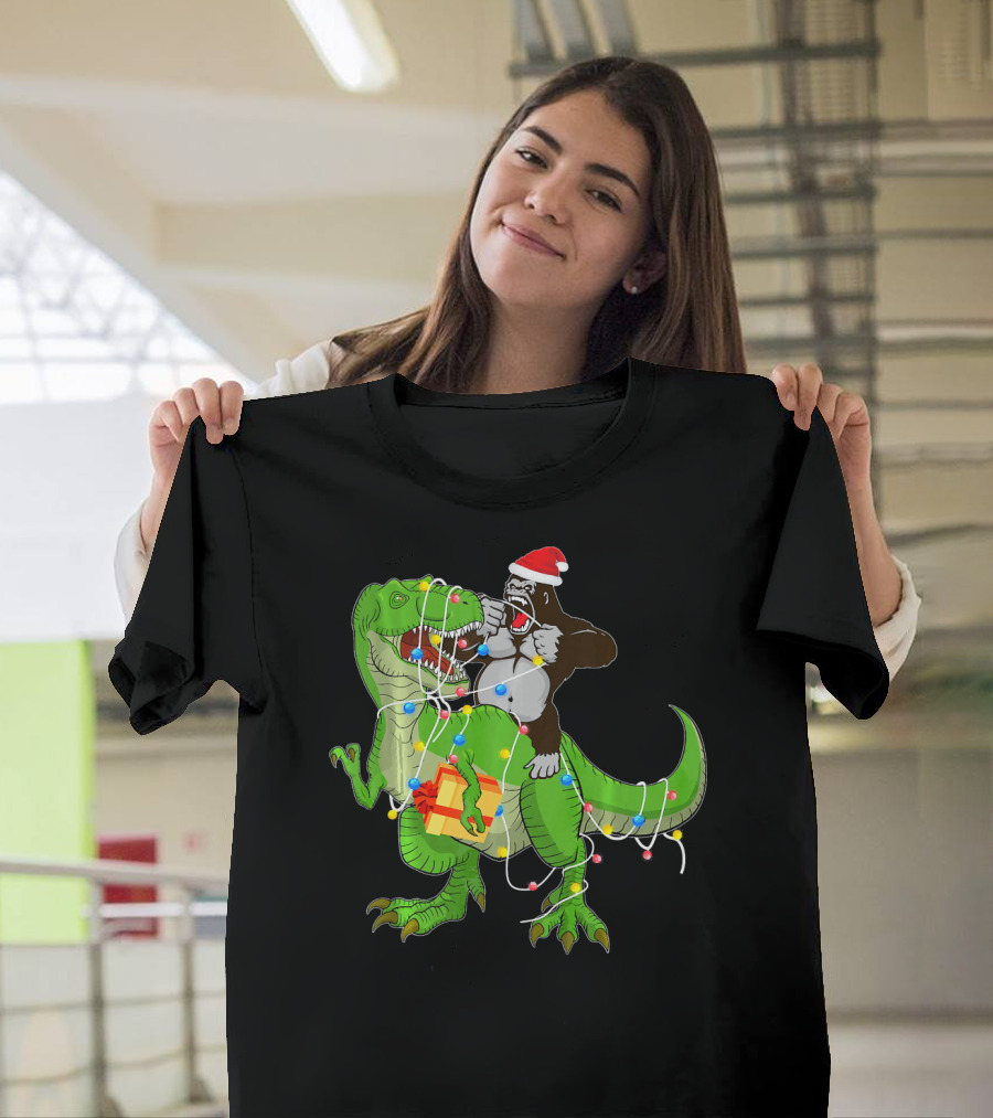 Gorilla Riding Dinosaur Rex Christmas Lights Santa Hat Present T-Shirt