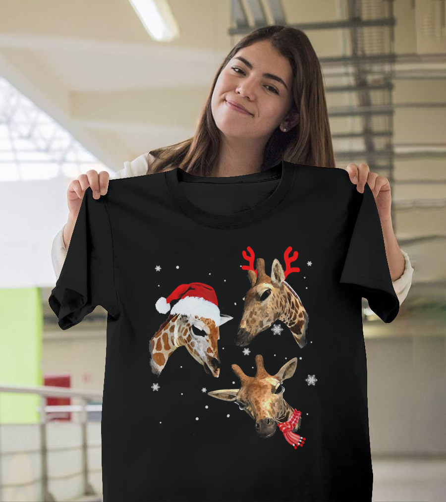 Three Giraffe Christmas Santa Hat Reindeer Antlers Scarf Snowflakes T-Shirt