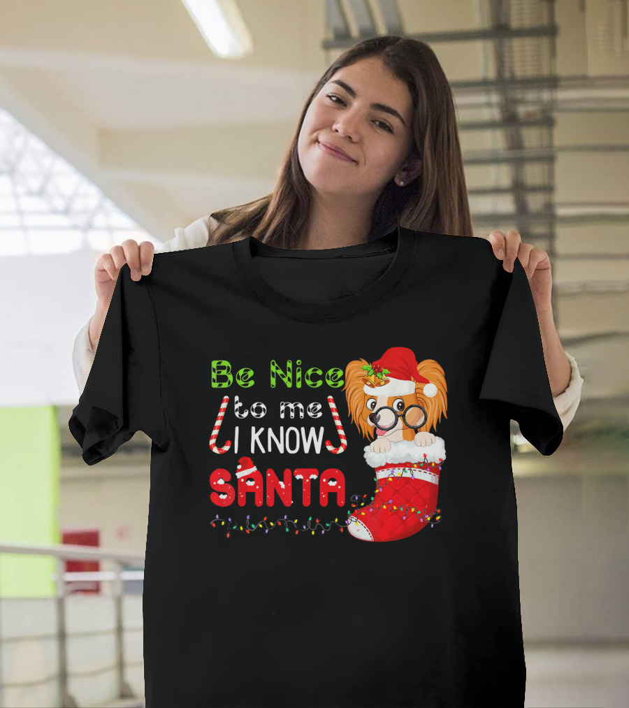 Be Nice to Me I Know Santa Papillon Dog in Santa Hat with Stocking and Christmas Lights T-Shirt