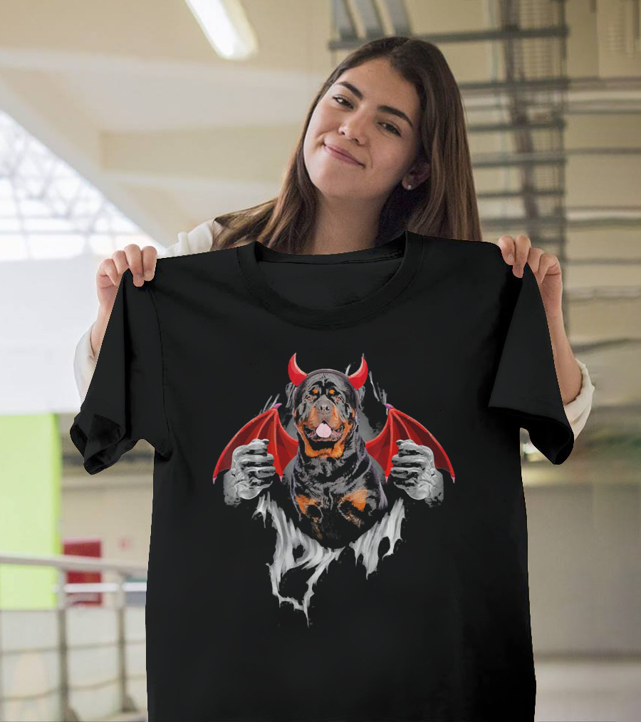 Rottweiler Dog with Devil Horns and Bat Wings في Torn T-Shirt