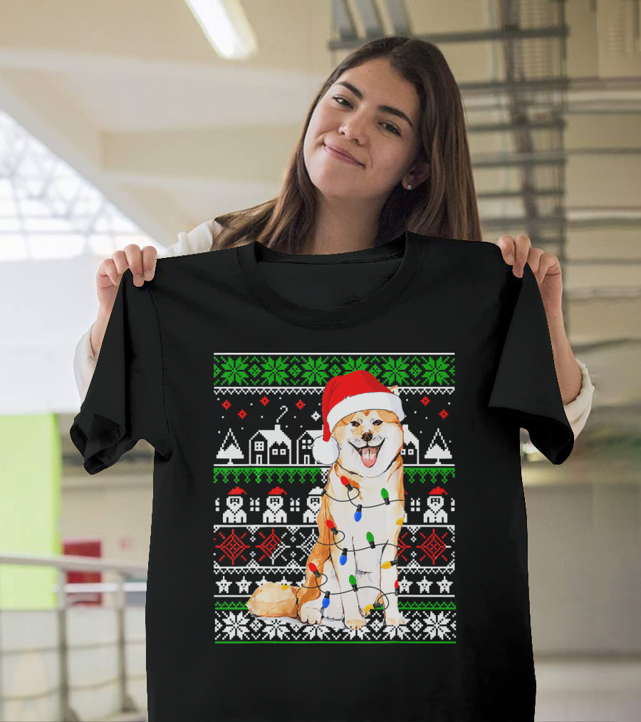 Akita Inu Wrapped in Christmas Lights with Santa Hat and Festive T-Shirt