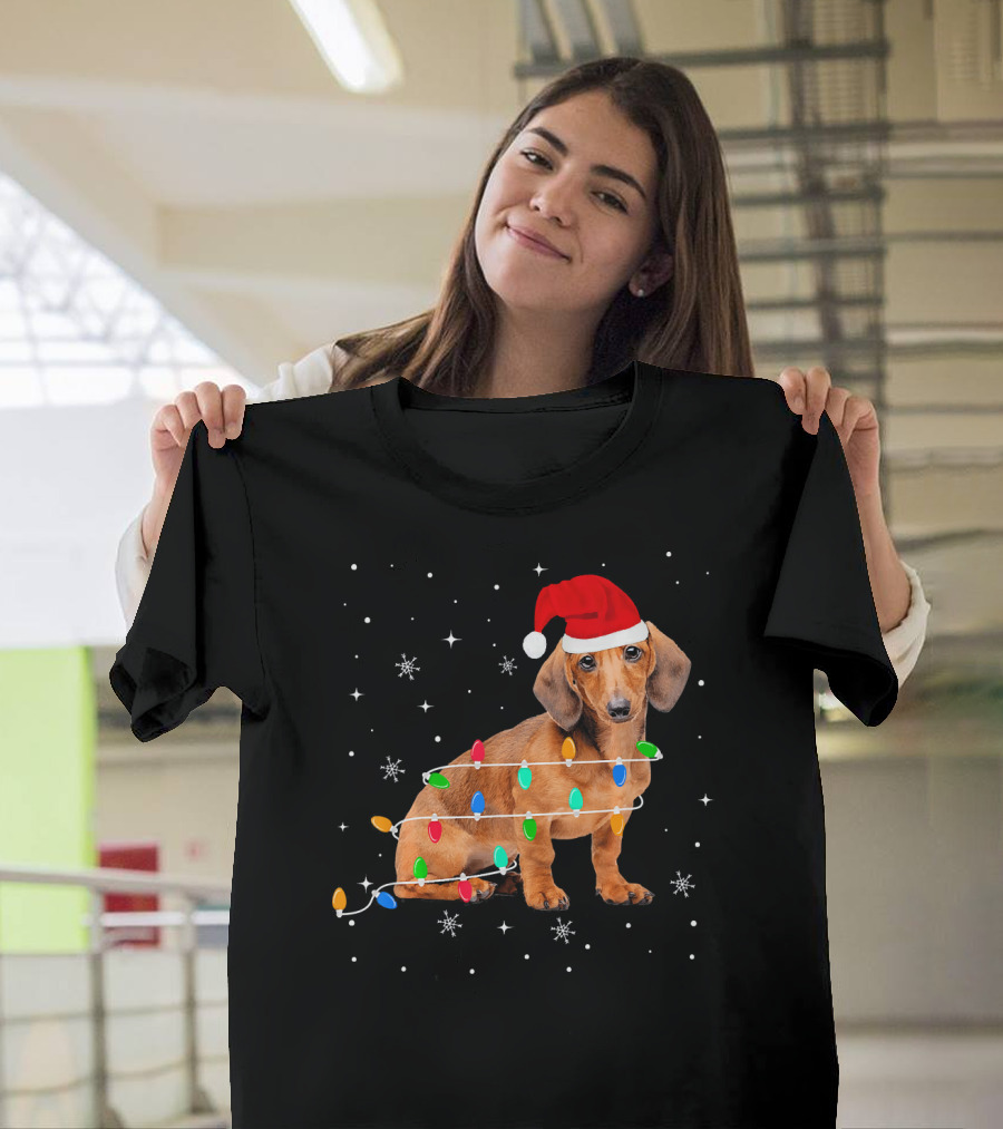 Dachshund Wrapped in Christmas Lights with Santa Hat and Snowflakes T-Shirt