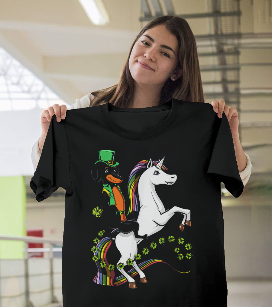 Dachshund Wiener Dog in Leprechaun Outfit Riding Rainbow Unicorn with Shamrocks T-Shirt