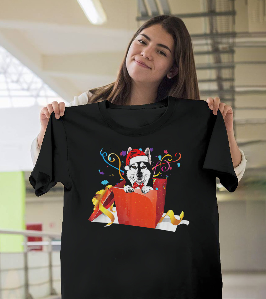 Siberian Husky Wearing Santa Hat in Festive Christmas Gift Box with Ribbons and Confetti T-Shirt