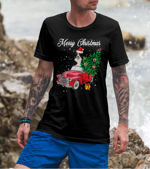 Merry Christmas Border Collie In Santa Hat Driving Red Truck With Christmas Tree And Gifts T-Shirt