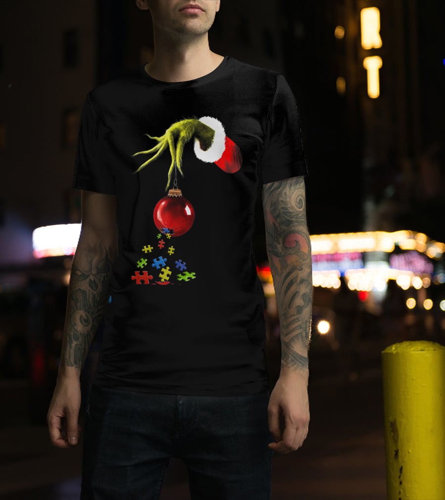 Grinch Hand Holding Red Ornament With Autism Puzzle Pieces T-Shirt