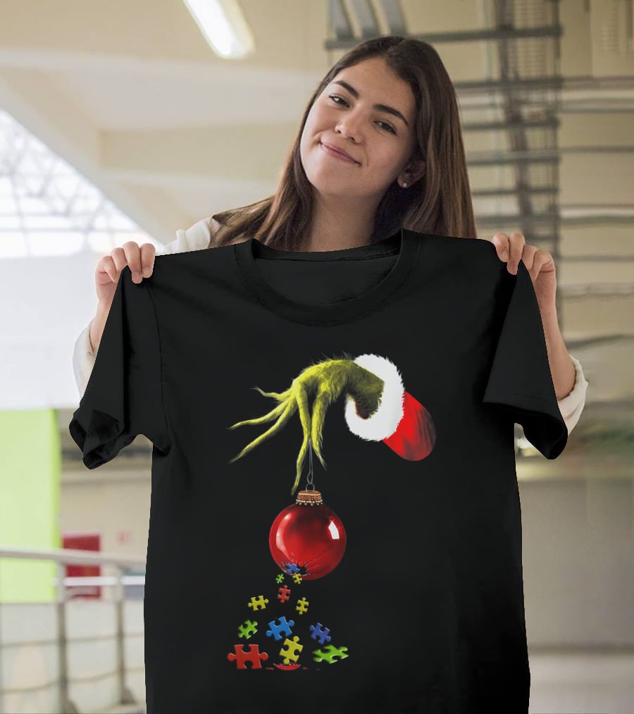Grinch Hand Holding Red Ornament With Autism Puzzle Pieces T-Shirt