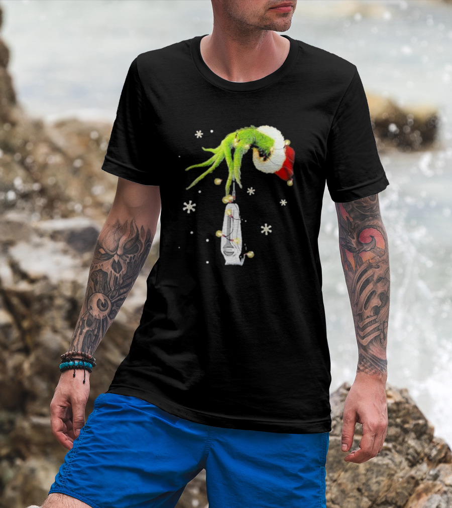 Grinch Christmas Hand Holding Clipper Snowflakes Santa Hat T-Shirt