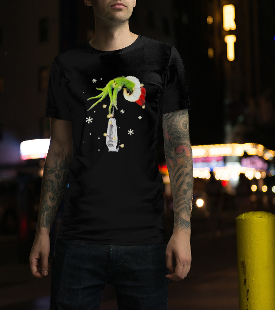Grinch Christmas Hand Holding Clipper Snowflakes Santa Hat T-Shirt