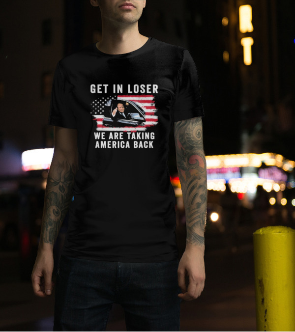 Get In Loser We Are Taking America Back Donald Trump Thumbs Up In Car With American Flag Background T-Shirt