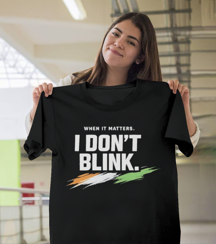 When It Matters I Don't Blink Bold Text With Orange White Green Brush Strokes T-Shirt