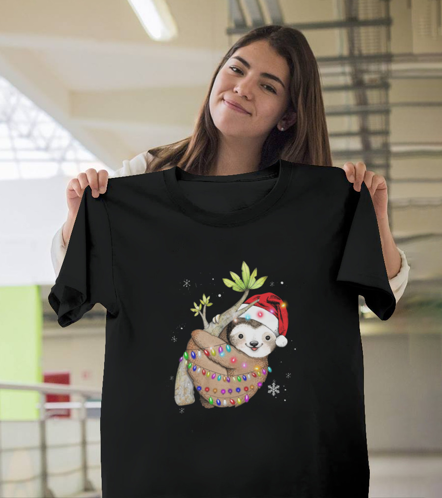 Santa Sloth Wrapped in Christmas Lights with Holiday Hat and Snowflakes T-Shirt