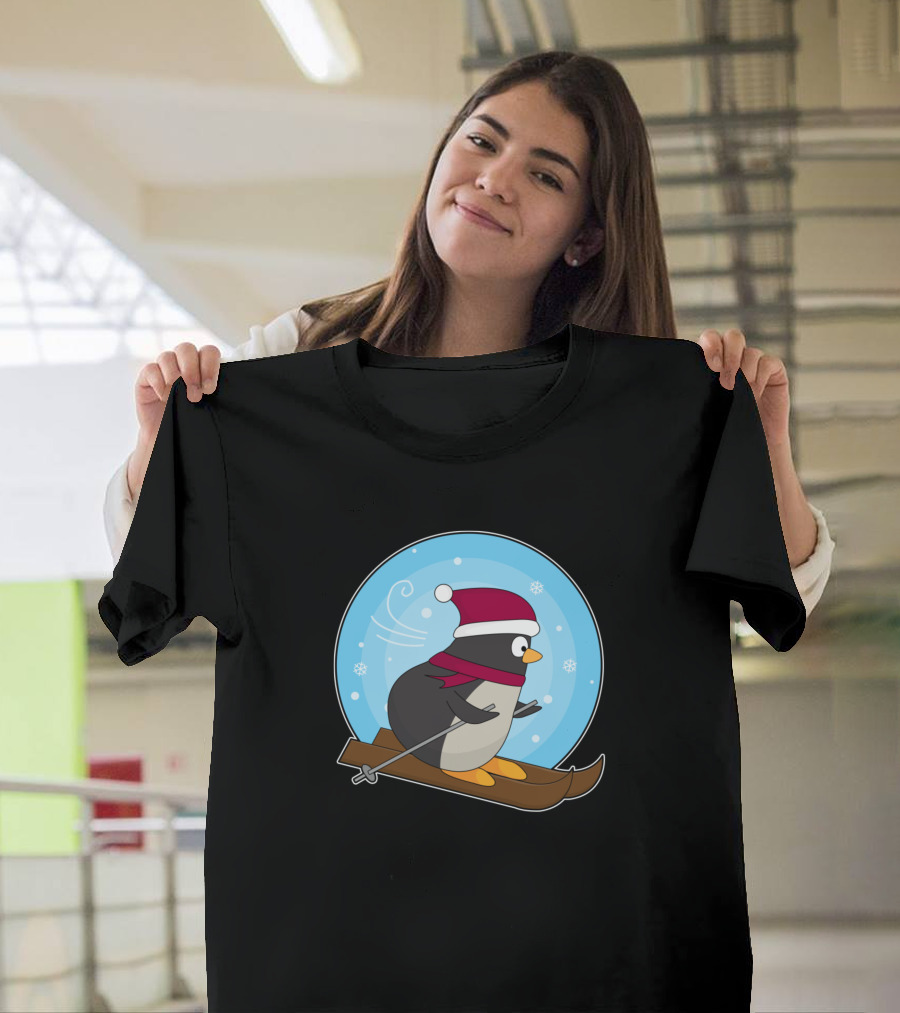 Penguin Skier in Red Hat and Scarf on Skis in Snow Globe T-Shirt
