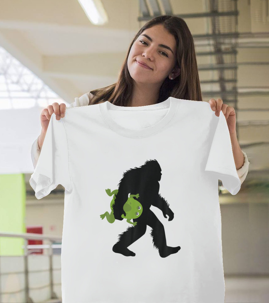 Bigfoot Carrying Frog Sasquatch With Tadpole Anima Frog on Bigfoot's Back T-Shirt