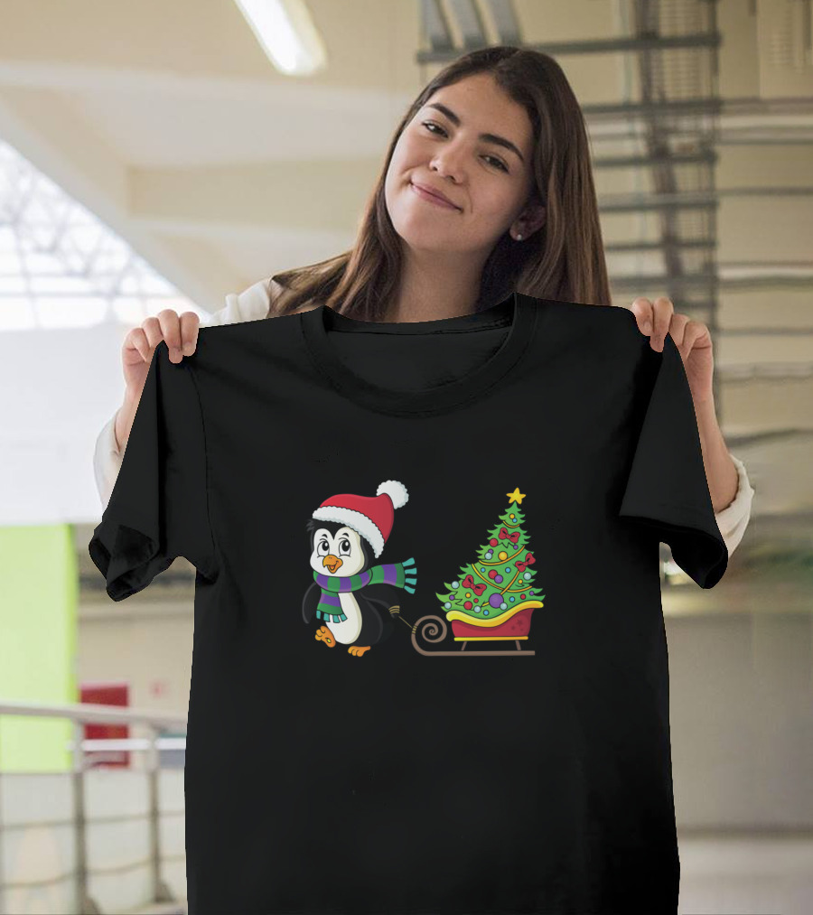 Penguin in Santa Hat Pulling a Festive Christmas Tree in Sleigh T-Shirt