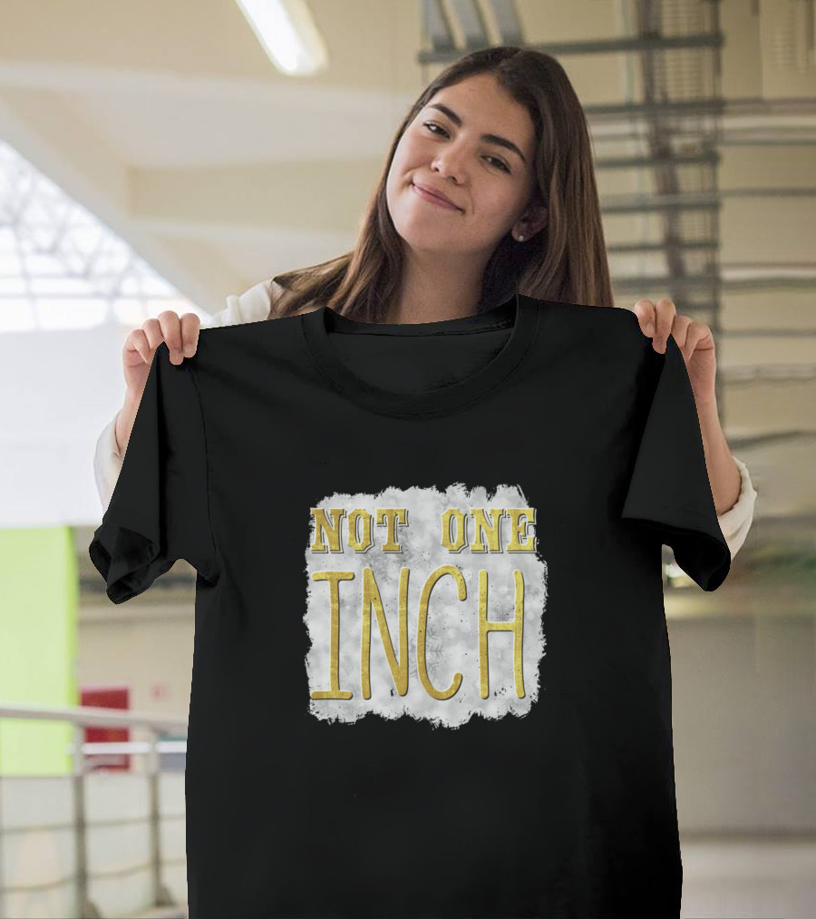 Not One Inch Typography Design in Bold Yellow on Distressed White Background T-Shirt