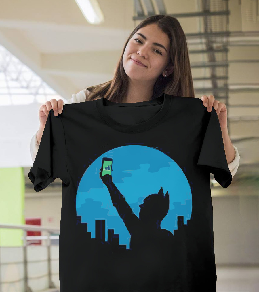 Bat Signal Silhouette Holding Smartphone Against City Skyline T-Shirt