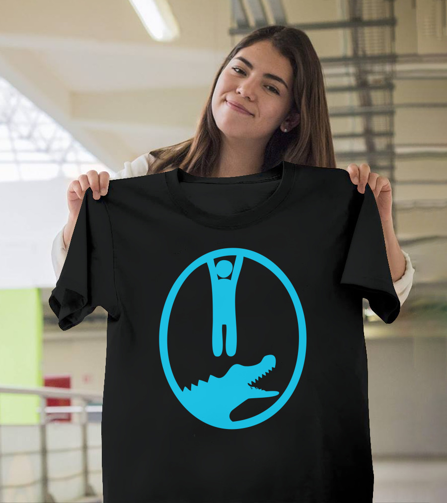 Crocodile Danger Stick Figure Hanging Above Open Jaws Blue Oval T-Shirt