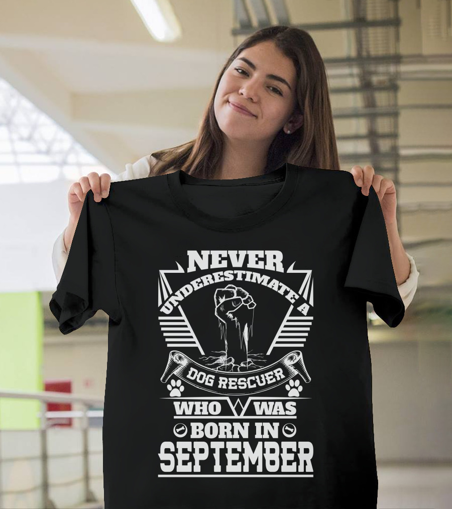 Never Underestimate a Dog Rescuer Born in September with Paw Prints and Raised Fist Graphics T-Shirt