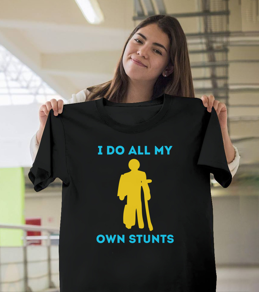 I Do All My Own Stunts Yellow Figure with Crutches T-Shirt