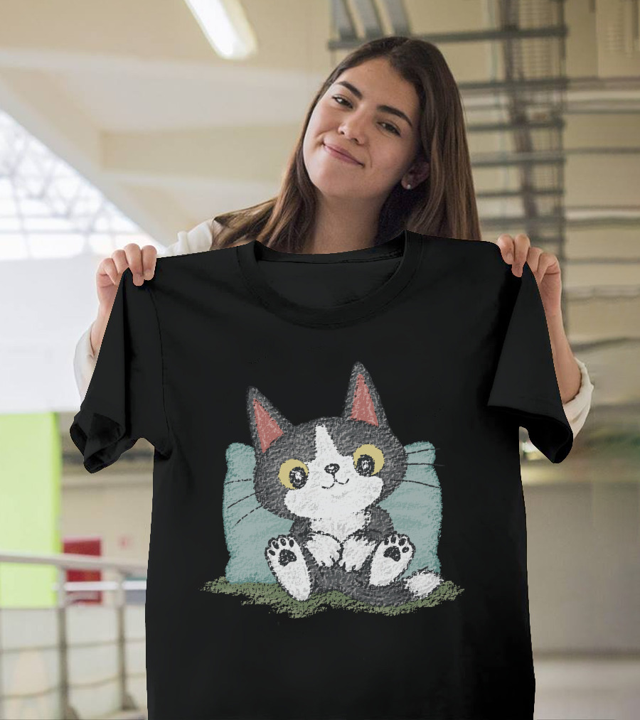 Black Kitten Relaxing on Blue Pillow with Green Background T-Shirt