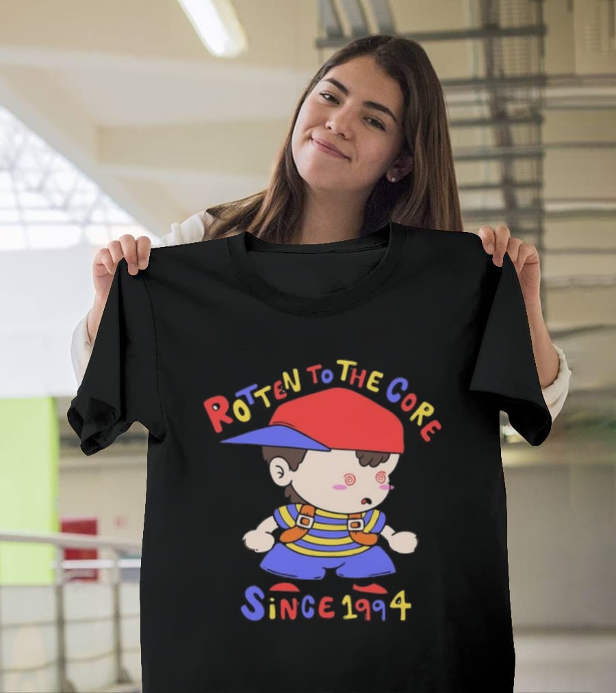 Rotten To The Core Since 1994 Cartoon Character With Red Cap And Striped T-Shirt