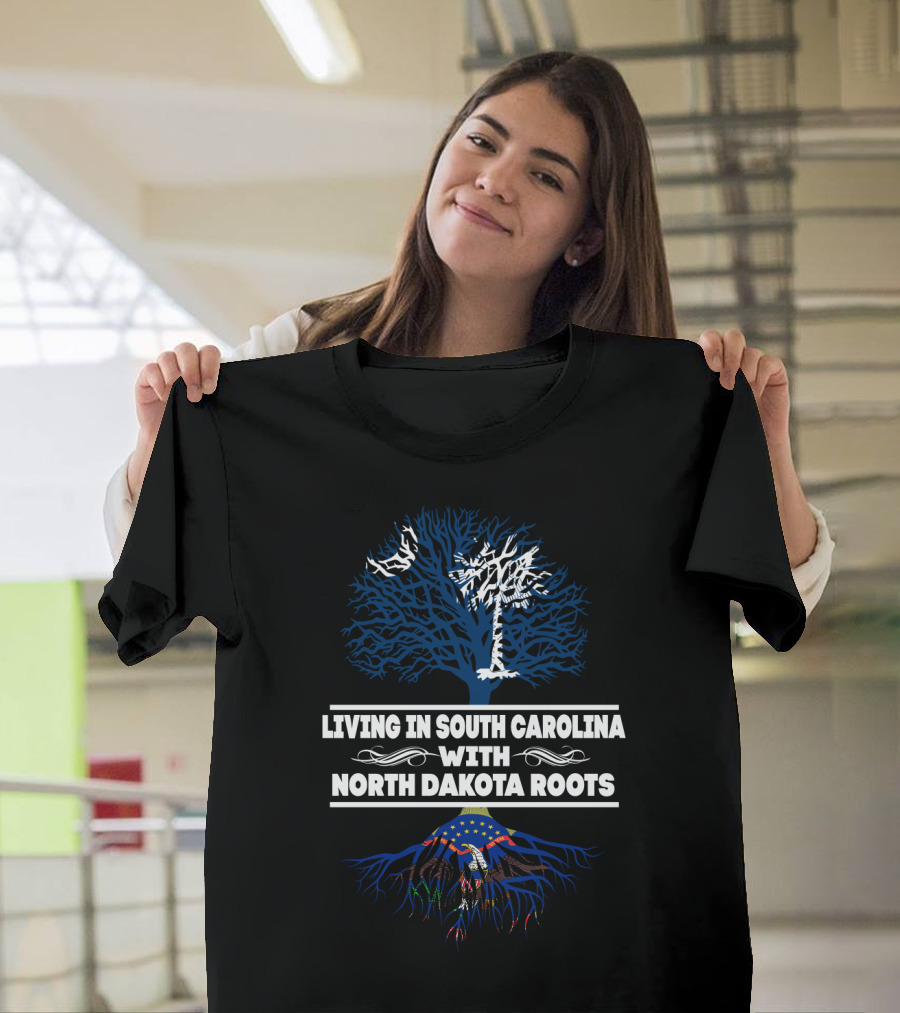 Living In South Carolina Proudly Displaying North Dakota Heritage With State Tree And Flag Roots T-Shirt
