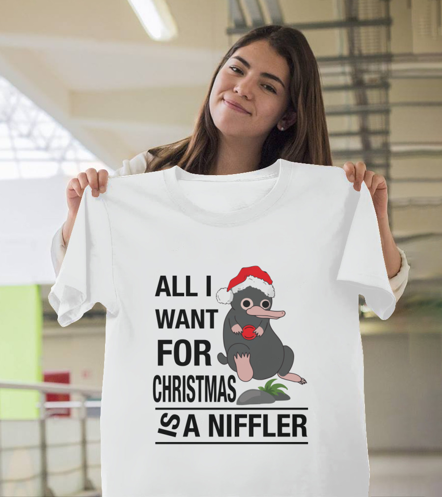 All I Want For Christmas Is A Niffler Wearing Santa Hat Holding Red T-Shirt