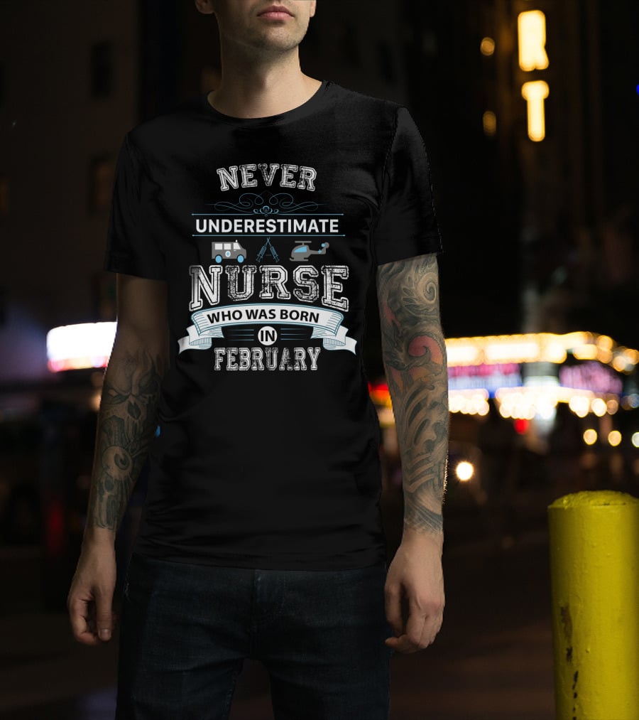 Never Underestimate A Nurse Who Was Born IN February With Medical Symbols And Transport Icons T-Shirt