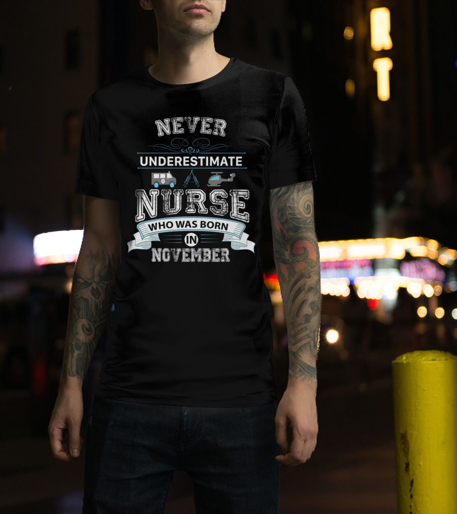 Never Underestimate A Nurse Born In November With Ambulance And Helicopter Elements T-Shirt