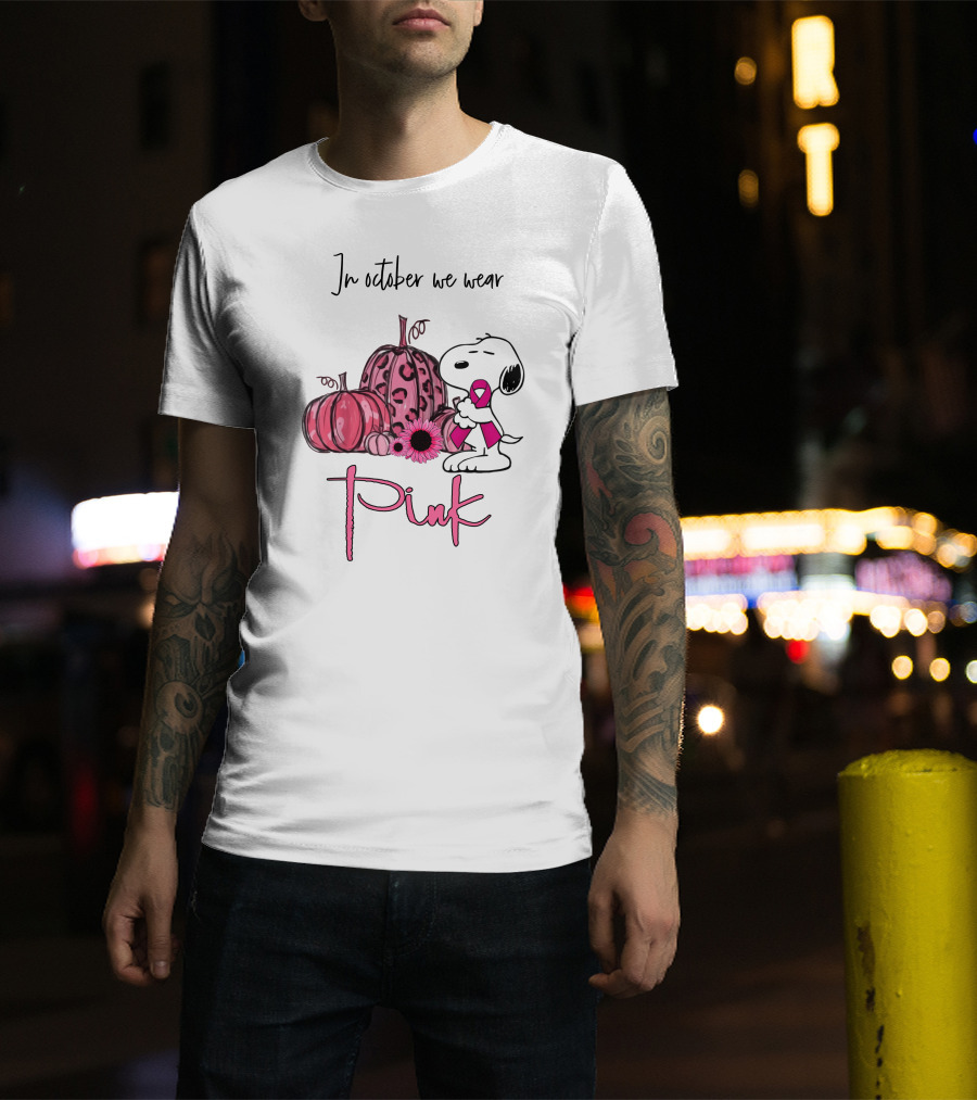 In October We Wear Pink With Peanuts Character Holding Ribbon And Pumpkins T-Shirt