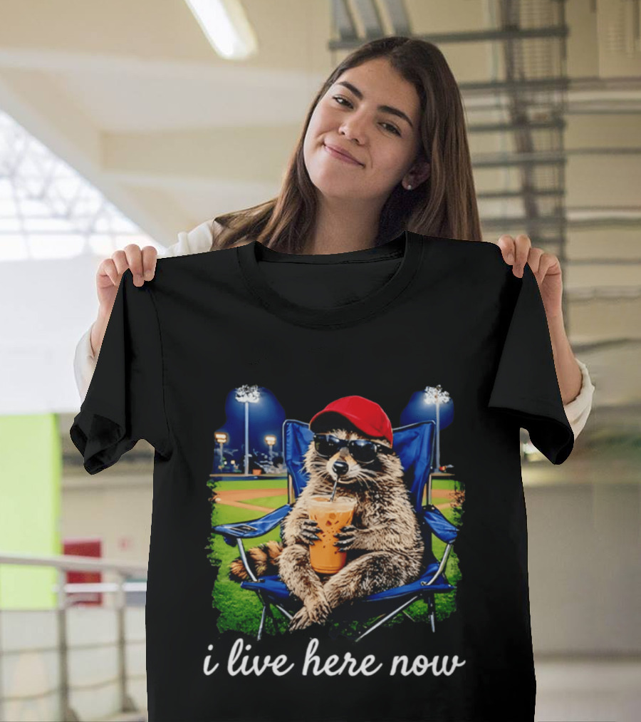 Raccoon I Live Here Now With Sunglasses And Drink At Baseball Field T-Shirt